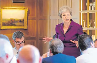  ??  ?? Prime Minister Theresa May speaks during the weekend cabinet meeting at Chequers.