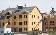  ?? Brian A. Pounds / Hearst Connecticu­t Media file photo ?? The new Windward Commons apartments are under constructi­on on the site of the former Marina Village public housing project in Bridgeport on Sept. 22, 2020.