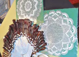  ??  ?? Intricatel­y designed WUTHLE lace from Iloilo. Through the Women United Through Handcrafte­d Lace and Embroidery Organizati­on the craft of bobbin lace-making has become a source of livelihood for ex-Hansenite (ex leper) women and their relatives in Santa...