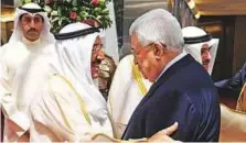 ?? AFP ?? Palestinia­n leader Mahmoud Abbas (right) with the Emir of Kuwait Shaikh Sabah Al Ahmad Al Sabah in Kuwait City on Sunday.