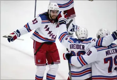  ?? GENE J. PUSKAR - THE ASSOCIATED PRESS ?? New York Rangers’ Chris Kreider (20) celebrates his goal during the third period in Game 6 of an NHL hockey Stanley Cup first-round playoff series against the Pittsburgh Penguins in Pittsburgh, Friday, May 13, 2022.