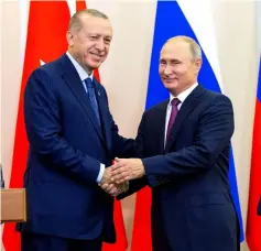  ??  ?? Putin (right) shakes hands with Erdogan after their joint press conference following the talks, in the Bocharov Ruchei residence in the Black Sea resort of Sochi.