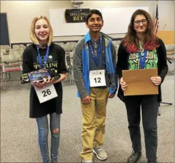  ?? LESLIE KROWCHENKO — DIGITAL FIRST MEDIA ?? Left to right, Phoebe Smith (first place), Aadarsh Balaji (second place) and Kelsey Celestino (third place) were the top finishers in the Delco Spelling Bee.