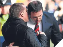  ??  ?? ■ Malky Mackay with Brendan Rodgers.