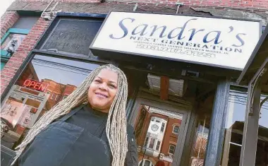  ?? Arnold Gold/Hearst Connecticu­t Media ?? Sandra Pittman, owner of Sandra's Next Generation, at her restaurant on Congress Avenue in New Haven.