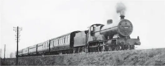  ??  ?? No 1138 is in charge of the down ‘ThamesFort­h Express’ near Kildwick on 29 February 1936. Loaded to just six coaches, all early period LMS designs with destinatio­n boards, the duty is well within the capacity of the class ‘4’ Compound. The normal winter loading for this service was five coaches, so on this occasion it has been strengthen­ed by the addition of an extra vehicle from the carriage sidings at Wellington Street. No 1138 was one of 25 LMS Compounds built by the North British Locomotive Co in Glasgow, being completed in July 1925 as Works No 23232. As British Railways No 41138 it would be withdrawn in December 1954.