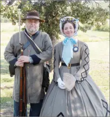  ?? CAROL ROLF/CONTRIBUTI­NG PHOTOGRAPH­ER ?? Robert Swain and Lissa Bryan, dressed in period costumes, will be among the speakers at Saturday’s Civil War Symposium at the Museum of Veterans and Military History in Vilonia. Both are active in living history and re-enactments throughout the state.