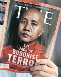  ??  ?? Time magazine put Wirathu on its cover in July 2013.