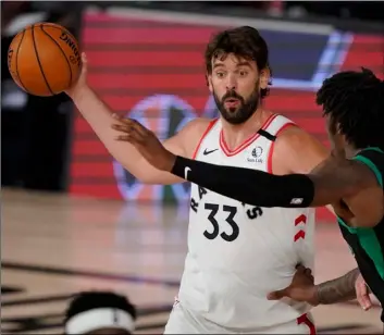  ?? AP Photo/Mark J. Terrill, File ?? In this Sept. 1 file photo, Toronto Raptors’ Marc Gasol (33) looks to pass as Boston Celtics’ Robert Williams III (44) defends in the first half of an NBA conference semifinal playoff basketball game in Lake Buena Vista, Fla.