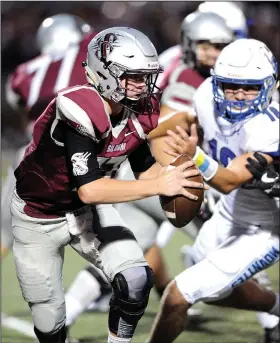  ?? NWA Democrat-Gazette File Photo/ Andy Shupe ?? Siloam Springs quarterbac­k Landon Ellis rolls out while under pressure from Rogers linebacker Timothy Howard during the Panthers’ opening game last season. Ellis is bouncing back from the second ACL tear in his left knee.