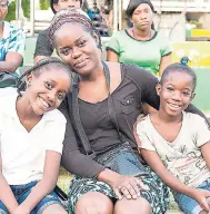  ??  ?? These participan­ts are all smiles at Prayer and Praise, held at Mandela Park on Friday, April 14.