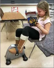  ??  ?? Brandywine Heights Elementary students in Mrs. Katie Hess’ class use under-desk cycles to keep in motion while reading or doing other educationa­l tasks.