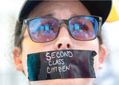  ?? STEFANI REYNOLDS/AFP VIA GETTY IMAGES ?? An abortion rights activist protests Friday near the Supreme Court in Washington, D.C.