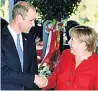  ??  ?? PALS William with Mrs Merkel