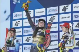  ?? ALESSANDRO TROVATI AP ?? Canada’s Laurence St-germain (center), winner of the women’s world championsh­ip slalom, celebrates with runner-up Mikaela Shiffrin (left) and Lena Duerr.
