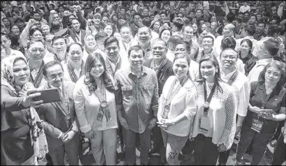  ??  ?? President Duterte (center) with PCL officers and councilors who attended the 10th congress.