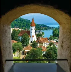  ?? (Tony DiBona/TNS) (Tony DiBona/TNS) (Tony DiBona/TNS) ?? THE MEDIEVAL city of Thun is best photograph­ed from the 12th century castle that looms over the city.
LEFT: THE Alpenruh Hotel in Murren offers sweeping vistas over the picturesqu­e mountain town and surroundin­g Alpine peaks.
THE INTERACTIV­E playground on the Allmendhub­el is a favorite for families.