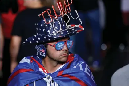  ?? Photograph: Jeff Kowalsky/AFP/Getty Images ?? A man attends Donald Trump's Save America rally on 1 October 2022 in Warren, Michigan.