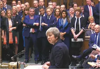  ?? AFP ?? Theresa May making a statement in the House of Commons in London yesterday.