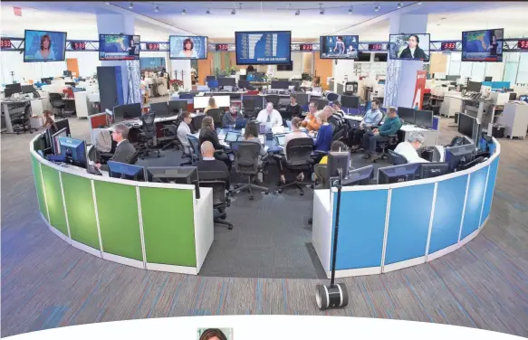  ?? JACK GRUBER/USA TODAY ?? Staff gathers in the USA TODAY newsroom during a morning news meeting.