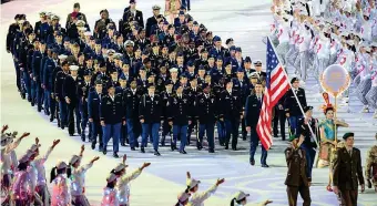  ??  ?? Parata
La squadra delle Forze armate Usa sfila all’inaugurazi­one dei Campionati mondiali militari a Wuhan, lo scorso ottobre