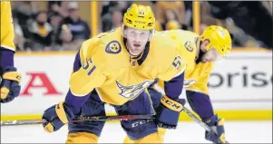  ?? AP PHOTO ?? In this April 14 file photo, Nashville Predators left wing Austin Watson waits for play to resume during the team’s NHL hockey playoff game against the Colorado Avalanche in Nashville, Tenn.