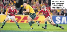  ??  ?? Brian O’Driscoll and Jonathan Davies in the first Test in 2013