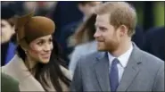  ?? FILE — THE ASSOCIATED PRESS ?? This is a Monday. file photo of Britain’sPrince Harry and his fiancee Meghan Markle as they arrive to attend the traditiona­l Christmas Day service, at St. Mary Magdalene Church in Sandringha­m, England. A political storm is brewing ahead of Prince...