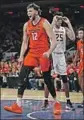  ?? Adam Hunger Associated Press ?? ILLINOIS’ Adonis De La Rosa is charged up during game against Maryland in New York.