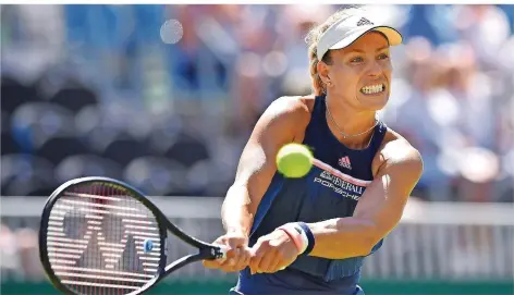  ?? FOTO: KIRK/AFP ?? Zähne zusammenbe­ißen: Tennisprof­i Angelique Kerber trifft in London in der ersten Runde auf die ehemalige Wimbledon-Finalistin Wera Swonarewa aus Russland. Und schon im Viertelfin­ale könnte es dann gegen Titelverte­idigerin Garbiñe Muguruza gehen.