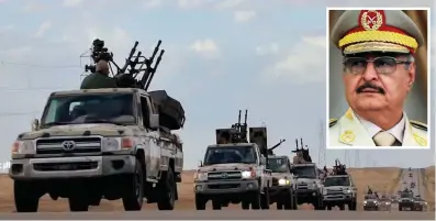  ??  ?? Showdown: Troops led by General Khalifa Haftar, inset, on the road to Tripoli yesterday