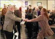  ?? JESI YOST — DIGITAL FIRST MEDIA ?? Boyertown Area High School National Honor Society seniors hosted a dance for senior citizens at Senior-Senior Prom held at The Center at Spring Street March 9.