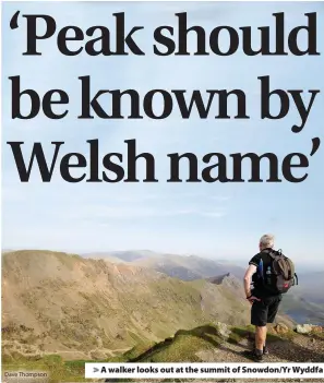  ??  ?? Dave Thompson > A walker looks out at the summit of Snowdon/Yr Wyddfa