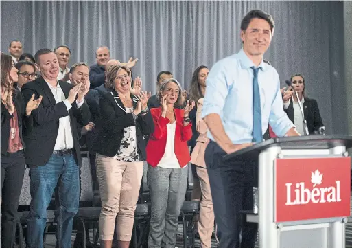  ?? JUSTIN TANG THE CANADIAN PRESS ?? Liberal strategist­s are optimistic Prime Minister Justin Trudeau will secure victory, though factors like economic anxiety and populist politics are causing concern.