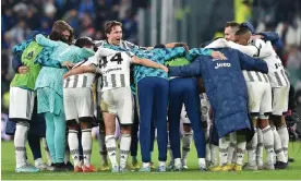  ?? Di Marco/EPA ?? Juventus players celebrate after beating Inter in the ‘derby d’Italia’. Photograph: Alessandro