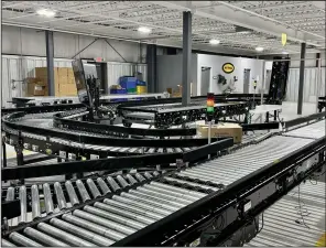  ?? (Arkansas Democrat-Gazette/Aaron Gettinger) ?? Conveyors set up for demonstrat­ions are displayed at the Hytrol Technology Center, 1901 Conveyor St. in Jonesboro, in February.