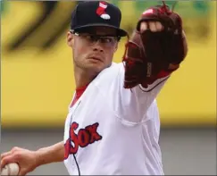  ?? File photo ?? Joe Kelly, who helped the Red Sox win the World Series last season, is settling into life with the Los Angeles Dodgers.