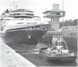  ?? PANAMA CANAL AUTHORITY ?? Disney Wonder was first passenger ship to transit Panama Canal locks.