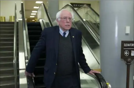  ?? JOSE LUIS MAGANA — THE ASSOCIATED PRESS ?? Sen. Bernie Sanders, I-Vt., walks to his office, Friday at Capitol Hill in Washington.