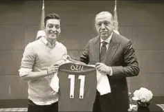  ?? REUTERS ?? Turkey’s President Recep Tayyip Erdogan with German midfielder Mesut Özil in London, May 13. The meeting sparked an enormous controvers­y in Germany.