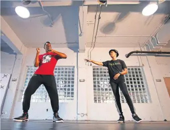  ??  ?? Temofe “T” Ogbe and Chris Shepard, dancers with RACE Dance Collective, rehearse on Tuesday for the Plaza District's “Solidarity in the Plaza: Black Lives Matter” event on Juneteenth. [DOUG HOKE/ THE OKLAHOMAN]