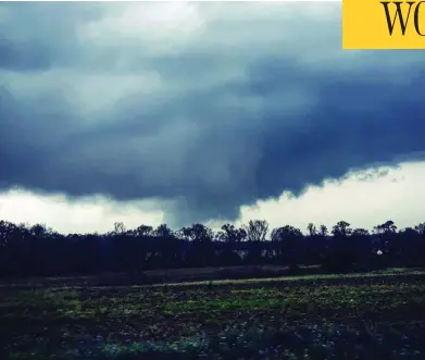  ?? AFP PHOTO / JUSTIN MERRITT VIA INSTAGRAM ?? A tornado touches down in Dothan, Ala., on Sunday, where at least one twister caused “catastroph­ic” damage and killed 23 people in the rural area, about 160 kilometres northwest of Tallahasse­e, Fla.