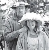  ?? B13twe05 ?? John and Leslie van Bogerijen of Kildonan were one of the three Easter bonnet prize-winners at Brodick Castle with their beautifull­y decorated bonnets.