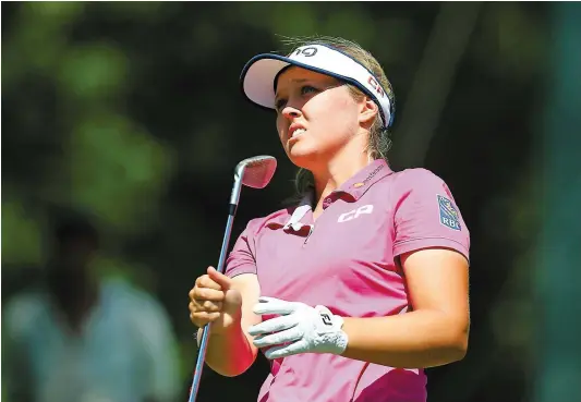  ?? PHOTO AFP ?? La Canadienne Brooke M. Henderson se retrouve à -9 après les deux premières rondes de la Classique Marathon.