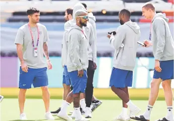  ?? — AFP photo ?? Pulisic (left) seen during a familiaris­ation visit at the Ahmad Bin Ali Stadium in Al-Rayyan, west of Doha.