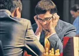  ??  ?? Viswanatha­n Anand (right) and Wesley So during their match in Kolkata on Friday.