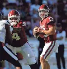  ?? BRYAN TERRY/THE OKLAHOMAN ?? Oklahoma’s Caleb Williams (13) drops back to pass behind protection from Marquis Hayes (54) and Andrew Raym last Saturday against Texas Tech.