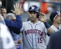  ?? CARLOS OSORIO — ASSOCIATED PRESS FILE ?? In a July 29, 2017, file photo, Astros designated hitter Carlos Beltran is congratula­ted after scoring during a game against the Tigers in Detroit.