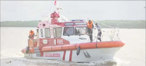  ??  ?? The Guyana Fire Service’s new boat in the Demerara River yesterday. (Department of Public Informatio­n photo)