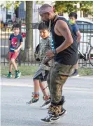  ?? JASON MARCK/WBEZ PHOTOS ?? ABOVE, LEFT: Axel Becerril (left), Sergio Abrajan Flores and other members of the Huehuecoyo­tl dance group practice at Harrison Park in Pilsen. ABOVE, RIGHT: Axel Becerril, 10, and Sergio Abrajan Flores dance to the beat of the drums.